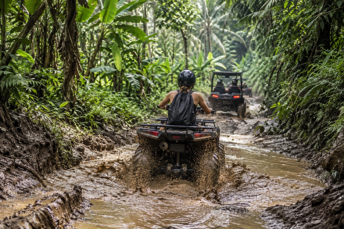 Illustrative ATV riders on a forest trail; not a KUBER operator photograph