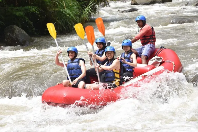 Rafting guests and guide on the Ayung River at Ayung Dewata