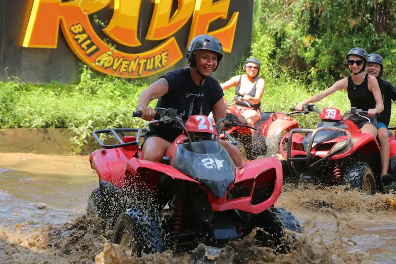 Helmeted riders on the Ride Bali Adventure ATV track